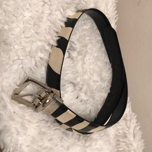 Reversible black belt and zebra.